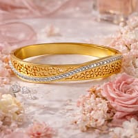 gold bracelet for women with floral design and crystal stones