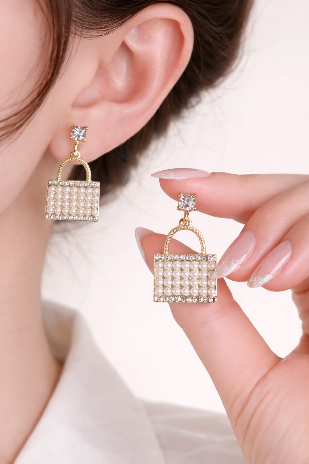 Pearl Handbag Drop Earrings with Gold Plating and Crystal Detailing