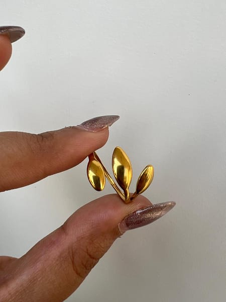 Gold Leaf Adjustable Ring for Women with triple leaf open design and adjustable band